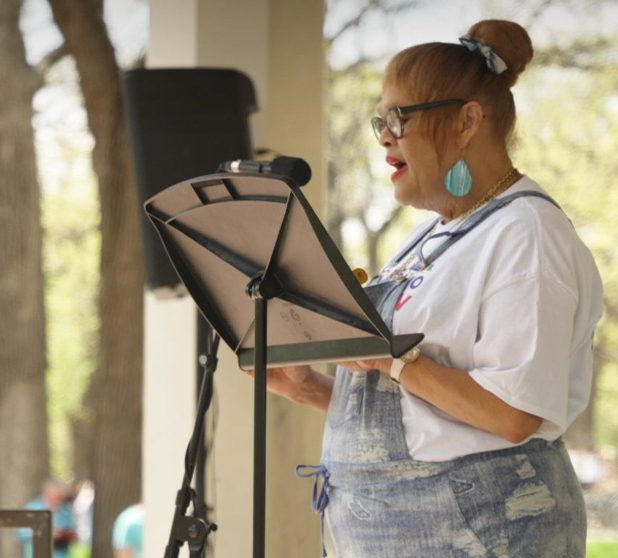 [Photo] Rea shares her story on the stage at the 34th Annual MN Walk to End HIV on May 15, 2022
